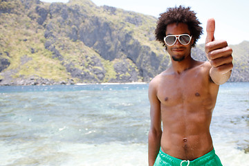 Image showing Happy guy on the beach