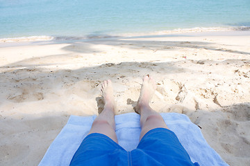 Image showing Legs on beach