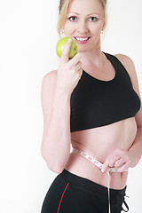 Image showing Apple a day keeps the pounds away