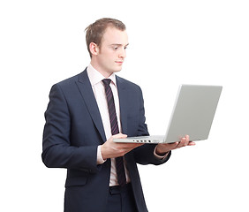 Image showing Business man with laptop