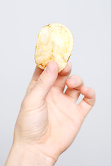 Image showing Handful of chips