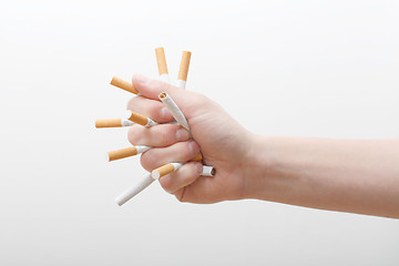 Image showing Crushing cigarettes