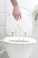 Image showing Flushing cigarettes