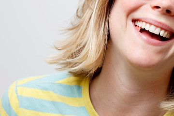 Image showing Girl playing with gum