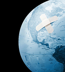 Image showing Globe with bandage