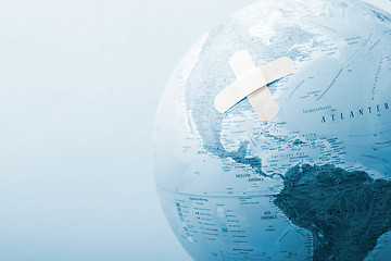 Image showing Globe with bandage