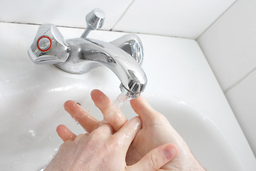 Image showing Washing hands