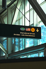 Image showing airport sign and blue window