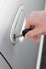 Image showing Opening car door