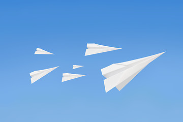 Image showing Paperplanes flying 