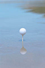 Image showing Golf ball on beach