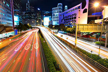 Image showing traffic light stream and highrise bulidings