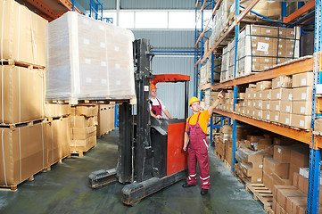 Image showing distribution in warehouse with forklift