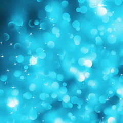 Image showing Bright glitters on a soft blue background, EPS 8