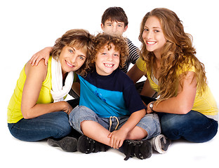 Image showing Happy young smiling family with two boys