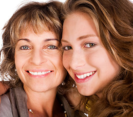 Image showing Close-up of smiling elder mum and daughter