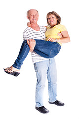 Image showing Playful senior couple having fun indoors