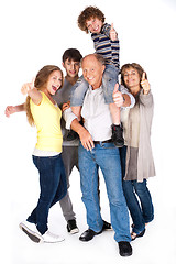 Image showing Thumbs-up family posing in style