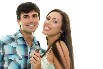 Image showing Smiling couple enjoying music together