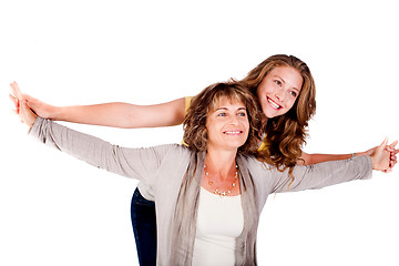 Image showing Mature mother with her daughter, indoors