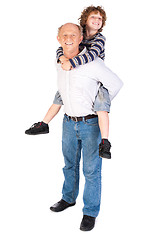 Image showing Grandfather giving grandson piggy-back