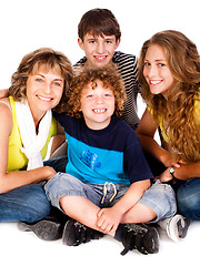 Image showing Happy young smiling family with two boys