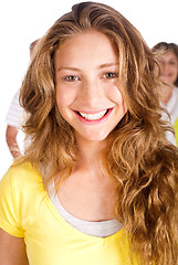 Image showing Gorgeous young woman with her parents in the background