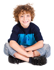 Image showing Cheerful kid relaxing on floor