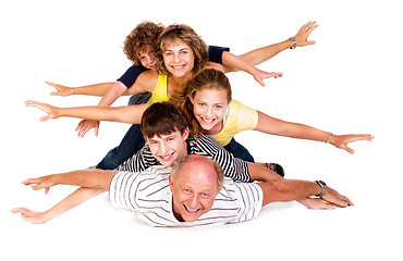 Image showing Cheerful family having fun in the studio