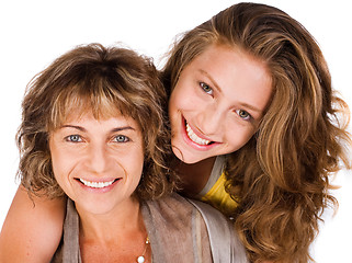 Image showing Close-up of smiling elder mum and daughter