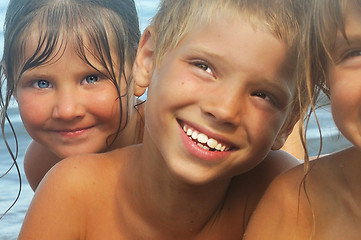 Image showing happy friends on the beach