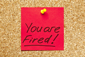 Image showing Red sticky note 'You are Fired!' 