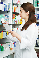 Image showing Pharmacy chemist woman in drugstore