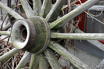 Image showing Weathered wagon wheel