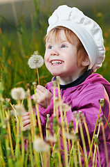 Image showing baby with dandelion