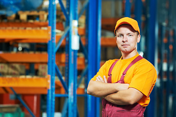 Image showing caucasian young manual worker in warehouse