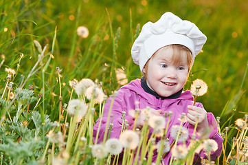 Image showing baby with dandelion