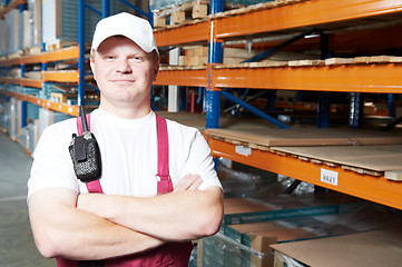 Image showing caucasian young manual worker in warehouse