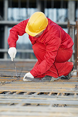 Image showing construction worker making reinforcement