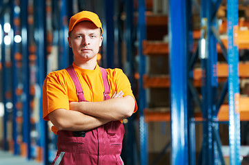 Image showing caucasian young manual worker in warehouse