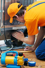 Image showing repair work on fridge appliance