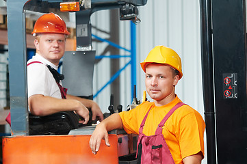 Image showing warehouse workers in storehouse