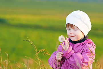 Image showing baby with dandelion
