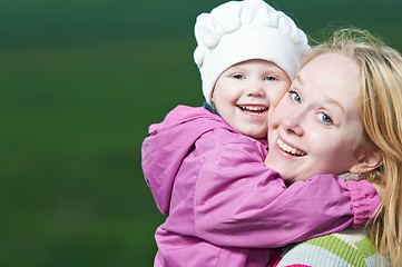 Image showing mother and child outdoors