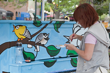 Image showing Painting mural on the piano