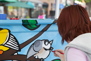 Image showing Painting mural on the piano