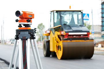 Image showing survey equipment at asphalting works