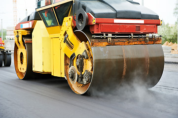 Image showing compactor roller at asphalting work