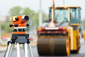 Image showing survey equipment at asphalting works