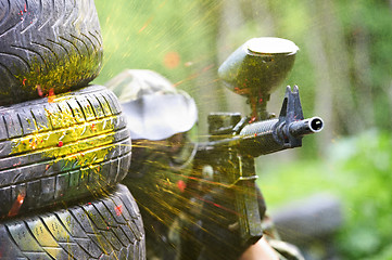 Image showing paintball player under gunfire